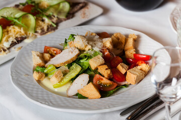 salad of baked chicken meat, individual salad