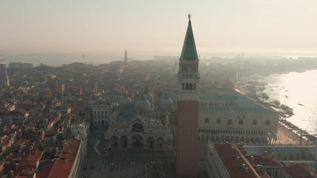 Establishing Aerial View of Venice Skyline Landmarks, Italy, European Romantic Touristic City Destination. Piazza San Marco with St Mark's Basilica and Campanile at Grand Canal. Orbit Panoramic shot 