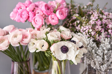 Set of white, pink and magenta flowers for Interior decorations. The work of the florist at a flower shop. Fresh cut flower.