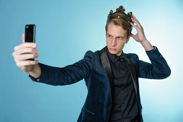 Brag about your success on social networks. A young man has received an achievement and takes a...