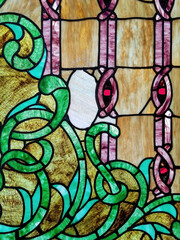 Close up of a stained glass window pattern