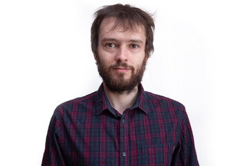 portrait shaggy young bearded man with long hair before haircut.