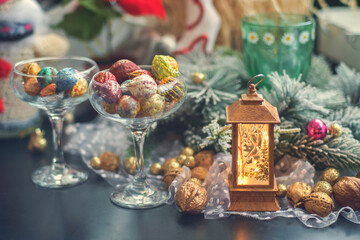 Obraz na płótnie Canvas Holiday Christmas decoration still life with colorful walnuts, selective focus