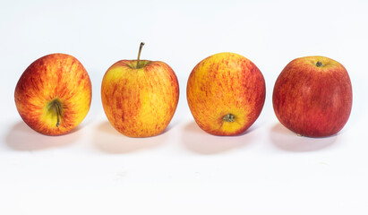 four red apple and yellow apples