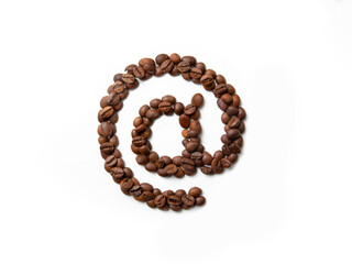 @ Symbol made from roasted coffee beans on white isolated background. At sign. White and brown.Decoration, design