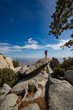 person on the top of the mountain