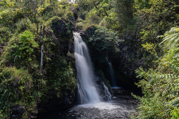 Fototapeta na wymiar Scenic waterfall along the road to Hana, east Maui shore, Hawaii