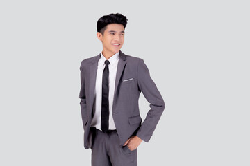 Obraz na płótnie Canvas Portrait young asian businessman in suit with confident and friendly isolated on white background, business man smart with success hand in pocket, manager or executive with handsome and leadership.