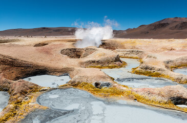 Sol de Manana (Morning Sun) geothermal area with steaming fumarole and mud pits, Uyuni region,...