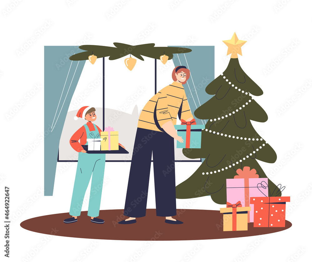 Canvas Prints Mom and son putting xmas gift boxes under christmas tree preparing for winter holidays celebration