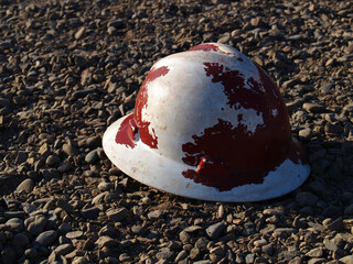 Hard Hat lying on gravel