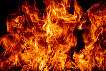 Flame fires. Burn lights on a black background. Fire flames on black background. Abstract fire...