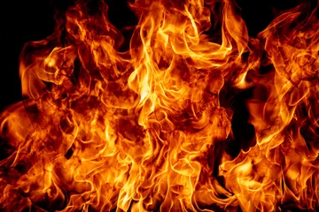 Küchenrückwand glas motiv Flamme brennt. Brennen Sie Lichter auf schwarzem Hintergrund. Feuerflammen auf schwarzem Hintergrund. Abstrakter Feuerflammenhintergrund. © Volodymyr