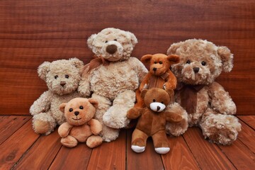 A teddy bears siting together.  We will miss you 