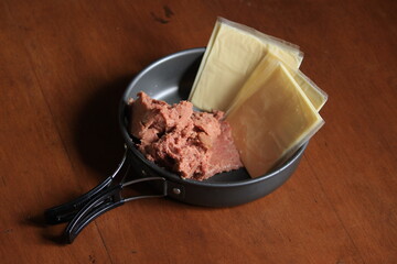 Layered cheese and ground beef are delicious for sandwiches, and other dishes.

