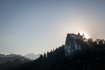 Selective blur on the Bled castle, also called Blejski Hrad, during summer, at sunset, by the...