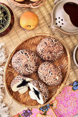 Fototapeta na wymiar Mushroom-shaped sesame buns on the table