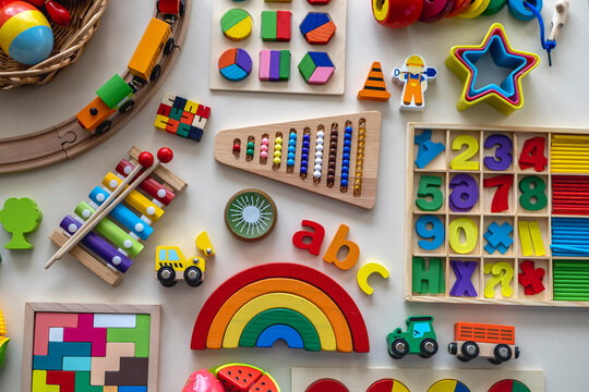 Variety of brightly colored children toys. Flat lay. Copy space.