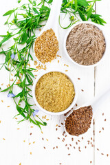 Bran and flour flaxseed in bowls on white board top