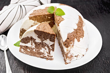 Dessert of curd and chocolate on wooden board