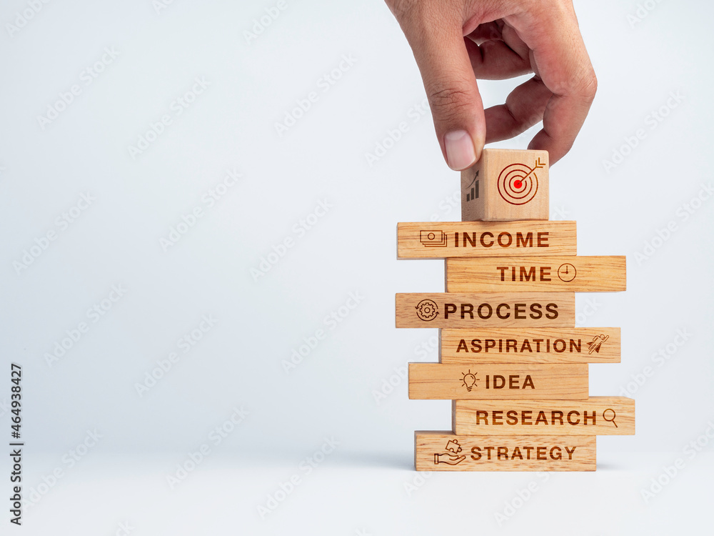 Poster 6 options or steps for business concept. hand put the goal target icon on wood cube on the top of st