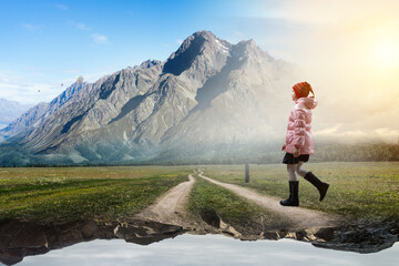 Fototapeta premium Little girl walking a landscape . Mixed media