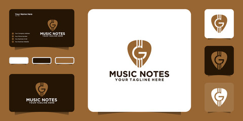 Fototapeta premium music logo with guitar pick and letter G with business card