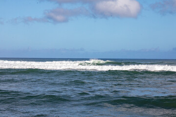 ocean waves and blue sky