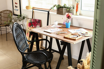 Workplace of artist in room