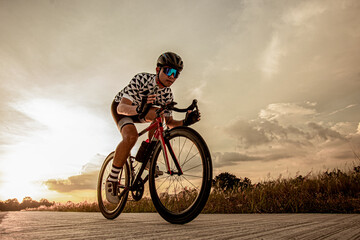 person riding a bicycle on road