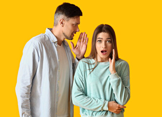 Gossiping people on color background