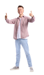 Young man in striped shirt showing thumbs-up on white background