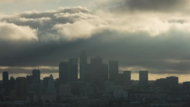 Timelapse of rolling clouds during sunset over Downtown Los Angeles