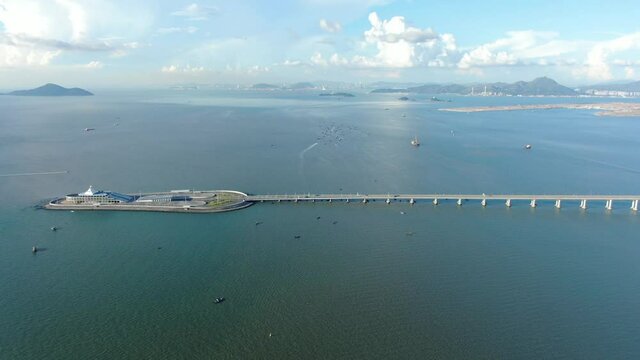 Hong Kong Zhuhai Macau Bridge on a beautiful day, wide angle aerial view.
