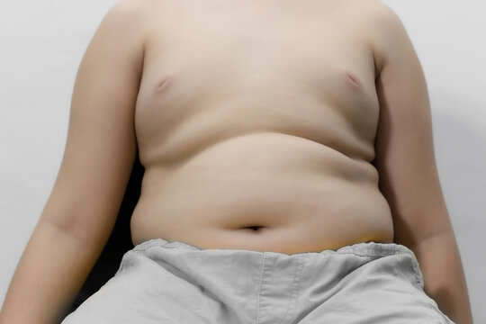 Obese fat Asian boy overweight on white background, Health care concept