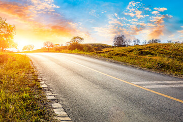 Empty asphalt road and beautiful cloud landscape at sunset.