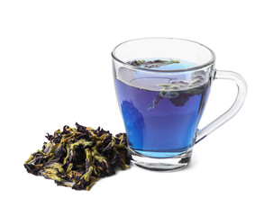 Cup of butterfly pea flower tea on white background