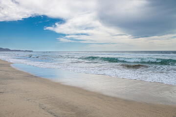 Fototapeta na wymiar A cloudy day on the beach at Los Cerritos Beach, Todos Santos Baja California Sur landscapes and seascapes of Mexico