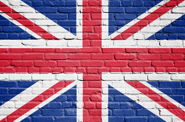 Fototapeta premium Flag of the United Kingdom painted on brick wall