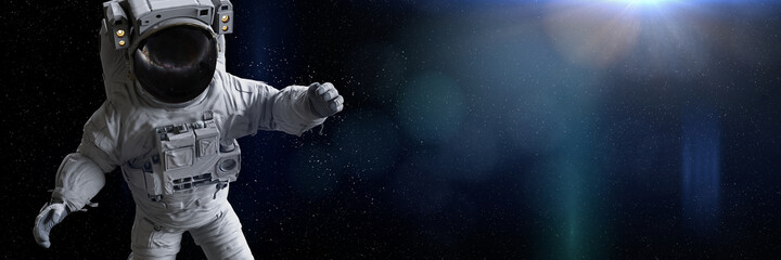 astronaut in empty space, background banner format 