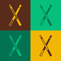 Pop art Crossed billiard cues icon isolated on color background. Vector