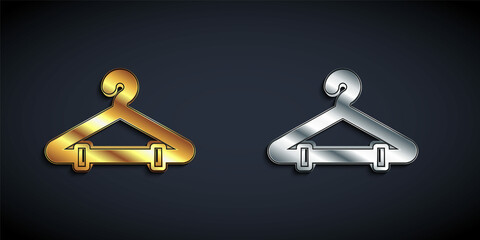 Gold and silver Hanger wardrobe icon isolated on black background. Cloakroom icon. Clothes service symbol. Laundry hanger sign. Long shadow style. Vector