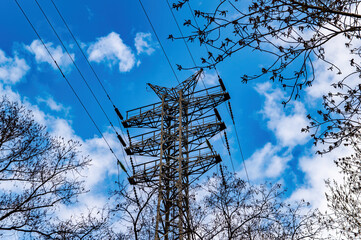 High voltage power transmission tower with wires. High voltage tower. Electric voltage wires....