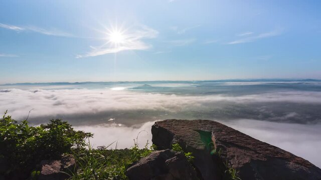 Timelapse sunrise and clouds flowing over the mountain. Khao Phra Ya Dern Thong View Point, Lop Buri, Thailand