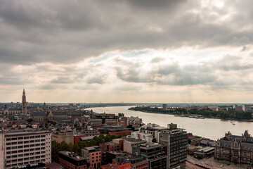 Antwerp, Belgium, a large body of water with a city in the background