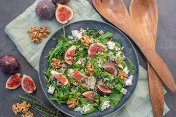healthy barley salad with fresh figs, feta cheese and walnuts