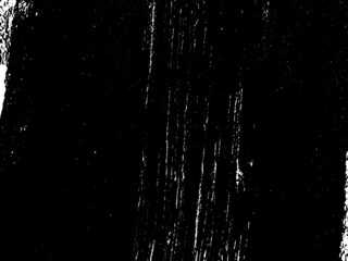 Fototapeta premium Grunge is black and white. Texture of black strokes on a white background. Abstract chaotic movements with a dry brush. Monochrome pattern of worn surface