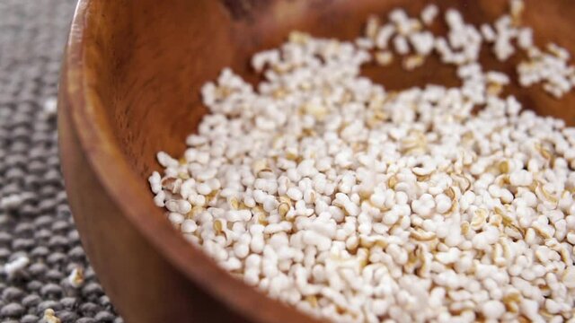 Falling amaranth popping, puffed grains. Pseudocereal food, gluten free. Macro