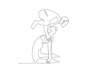 The couple who do sports together stand on top of each other and stay in balance. fitness yoga teamwork