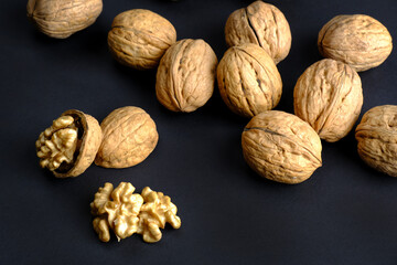 walnuts (akhrot) on black background, Dry fruits, walnut or akhrot well known dried fruit having shape like brain.